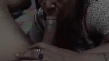 Indian mature aunty dick sucking